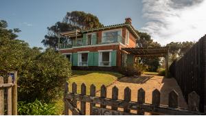 Front Row Ocean View Home located in Jose Ignacio, Punta del Este, Uruguay, listed by Curiocity Villas.